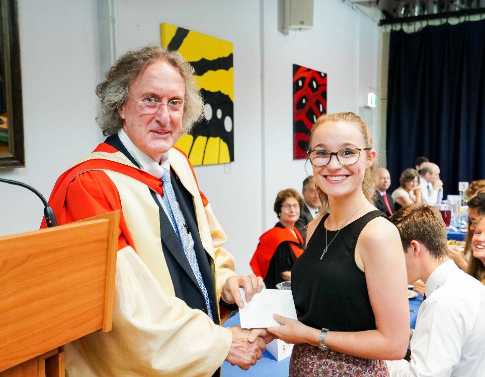 Resident receiving an academic award